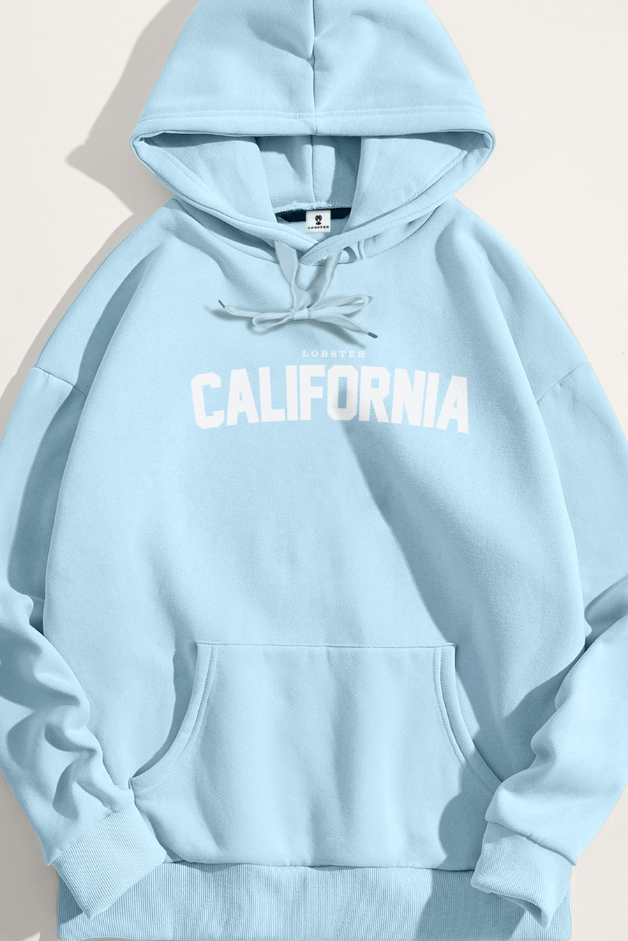 crop2-hoodie-flat-lay-ag-light-blue-5635