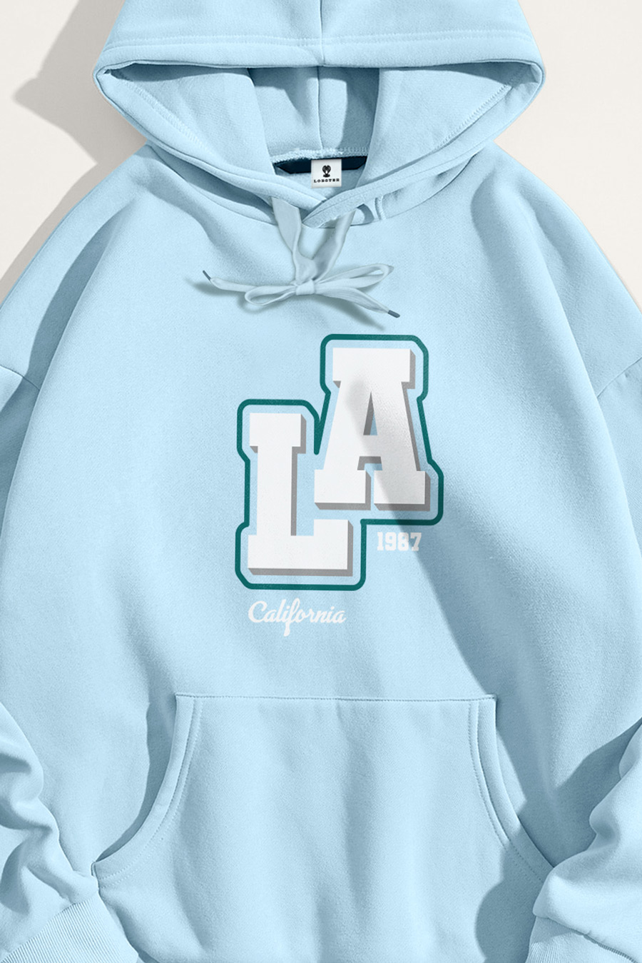 crop3-hoodie-flat-lay-ag-light-blue-5576